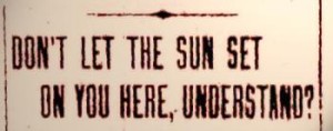 Sign at limits of a "sundown town"